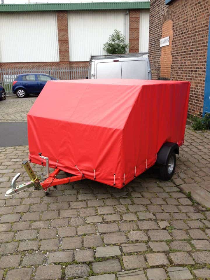 Small trailer with tarpaulin custom made cover from J Clemishaw in Bury